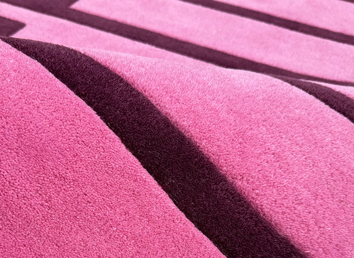 Close-up of pink wool rug
