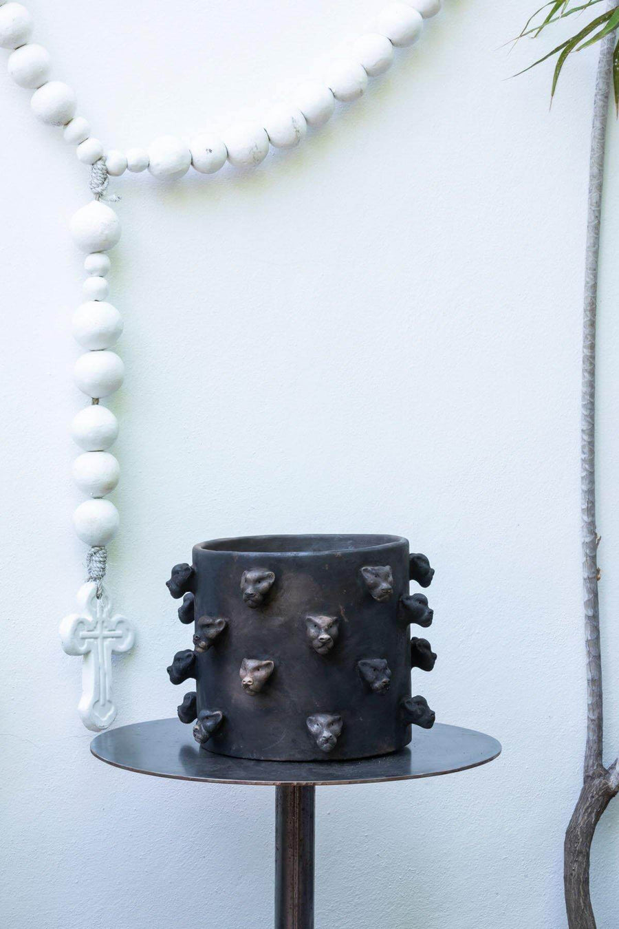 Elegant black ceramic planter, perfect for adding a modern touch to any space.