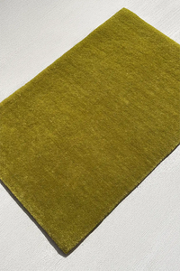 olive green 4x6 rectangular rug on a light gray background