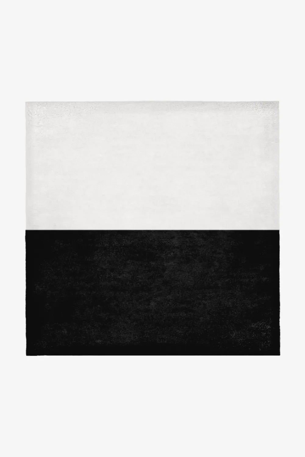 Crisp white and bold black wool square rug in 7x7 or 9x9 sizing, ideal for minimalist interiors, graphic modern homes, and high-contrast organic modern spaces.