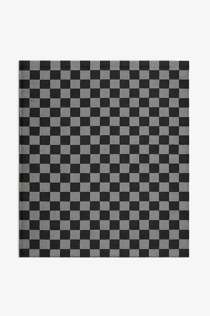 black and gray checkered wool rug