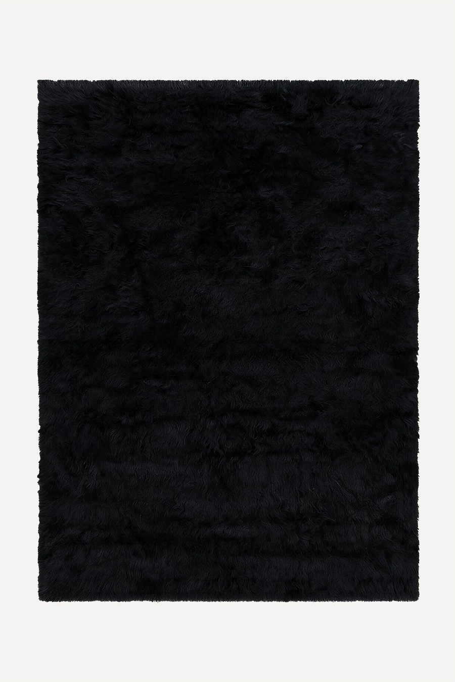 A rectangular black shaggy wool rug shown flat against a light off-white background.