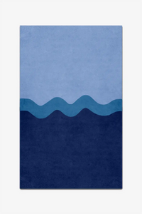Rug with wavy blue pattern on a white background