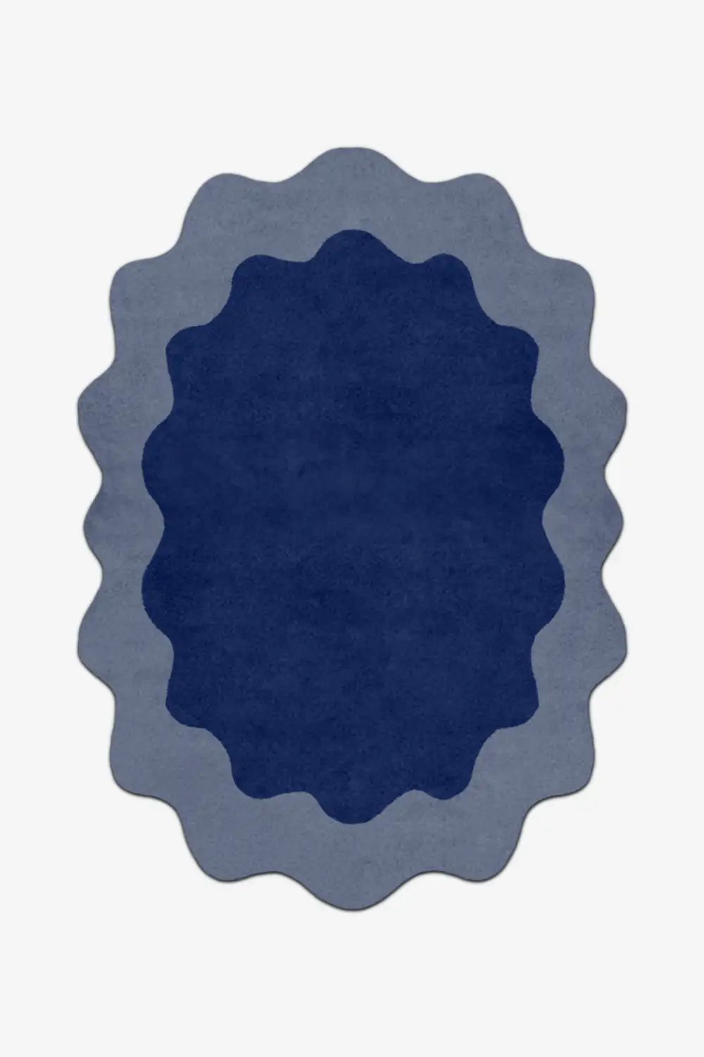 Blue oval rug with scalloped edge on a white background