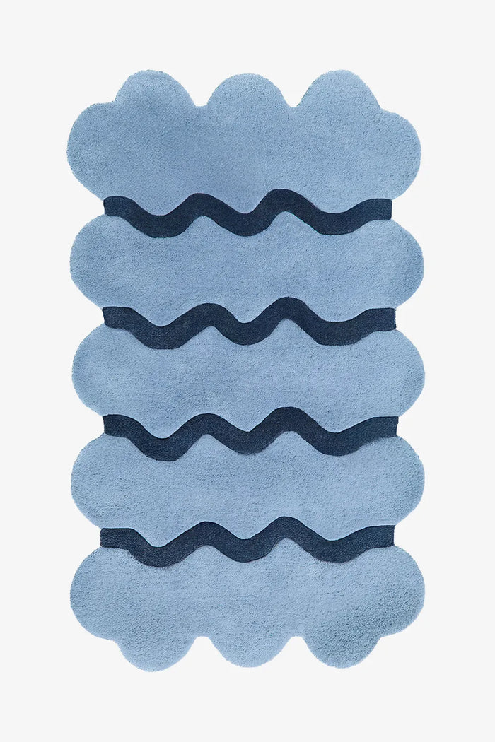 Light blue scalloped wool rug with dark blue ripple stripes, modern abstract blue area rug for living room