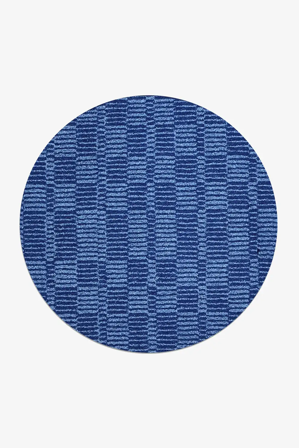 Blue circular rug with a textured plaid-like pattern on a white background