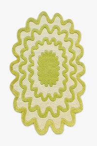 Lime green ripple rug with scalloped edges, perfect as a funky oval area rug for a modern living room