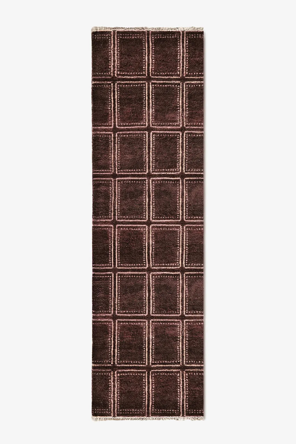 brown runner rug with a checkered pattern on a white background
