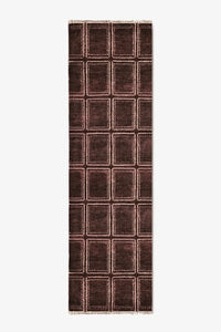 brown runner rug with a checkered pattern on a white background