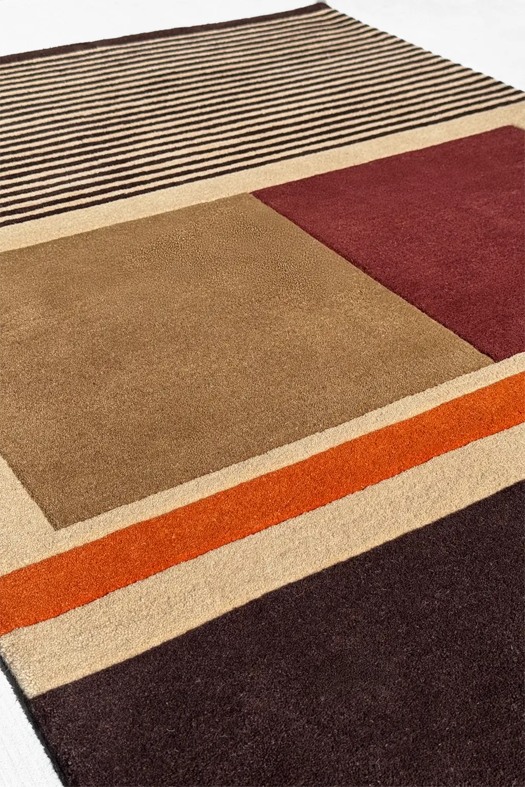 Textured striped wool rug in brown and tan with soft contrast and depth