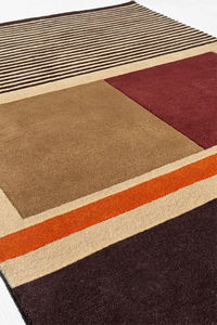 Textured striped wool rug in brown and tan with soft contrast and depth