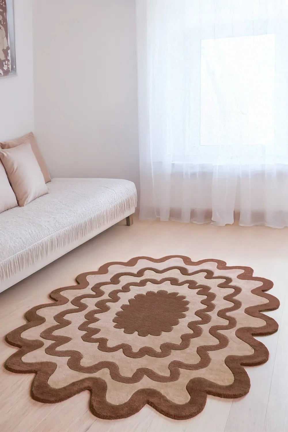 Modern brown oval rug in minimalist living room, neutral wavy wool area rug lifestyle