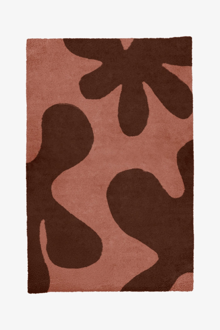 custom modern rug with brown and pink colors on a white background