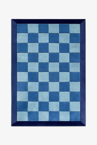 custom rug with checkered pattern and border design