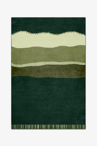 Rug with wavy pattern in dark green and light olive green stripes on a white background