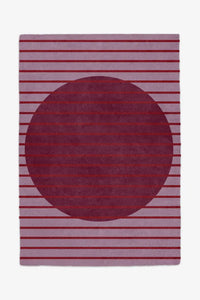 custom sized rug in moody mauve and plum wool