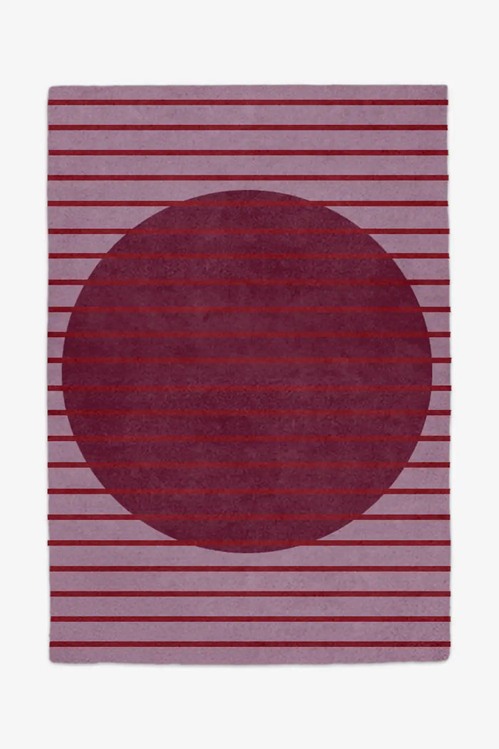 custom sized rug in moody mauve and plum wool