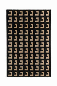 A custom rug featuring a repeating geometric pattern of beige stylized letterforms arranged in a grid, shown flat against a white background.