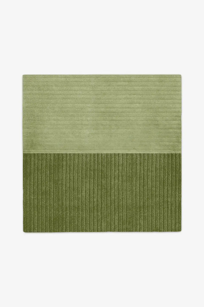 custom green rug with a textured pattern on a white background