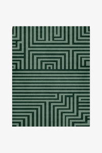 custom wool rug with green geometric pattern