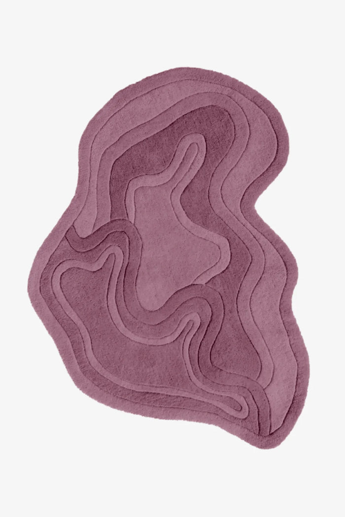 custom wool rug with wavy design on a white background