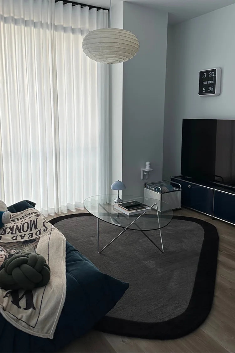 custom diamond shaped rug with black border on a white background