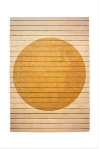 custom rug with a large circular design on a wooden floor