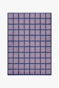 Dusty purple and navy tiled wool rug with graphic grid design modern