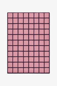 Rose pink and deep purple tiled rug in a striking modern palette
