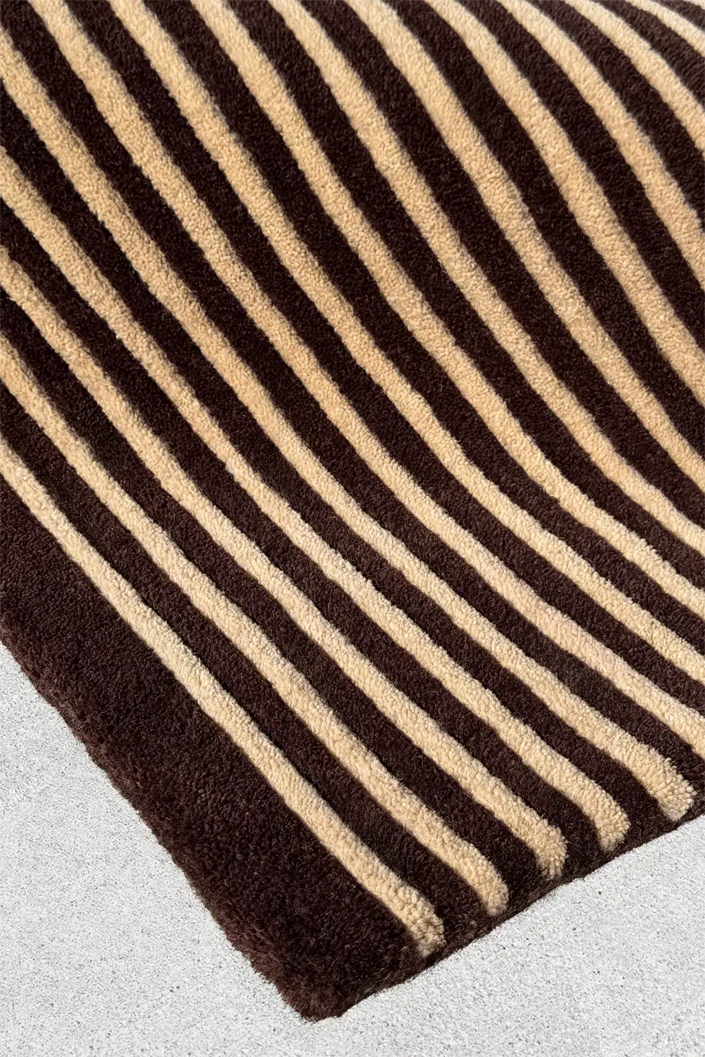 Modern brown 4x6 wool area rug with graphic stripe design