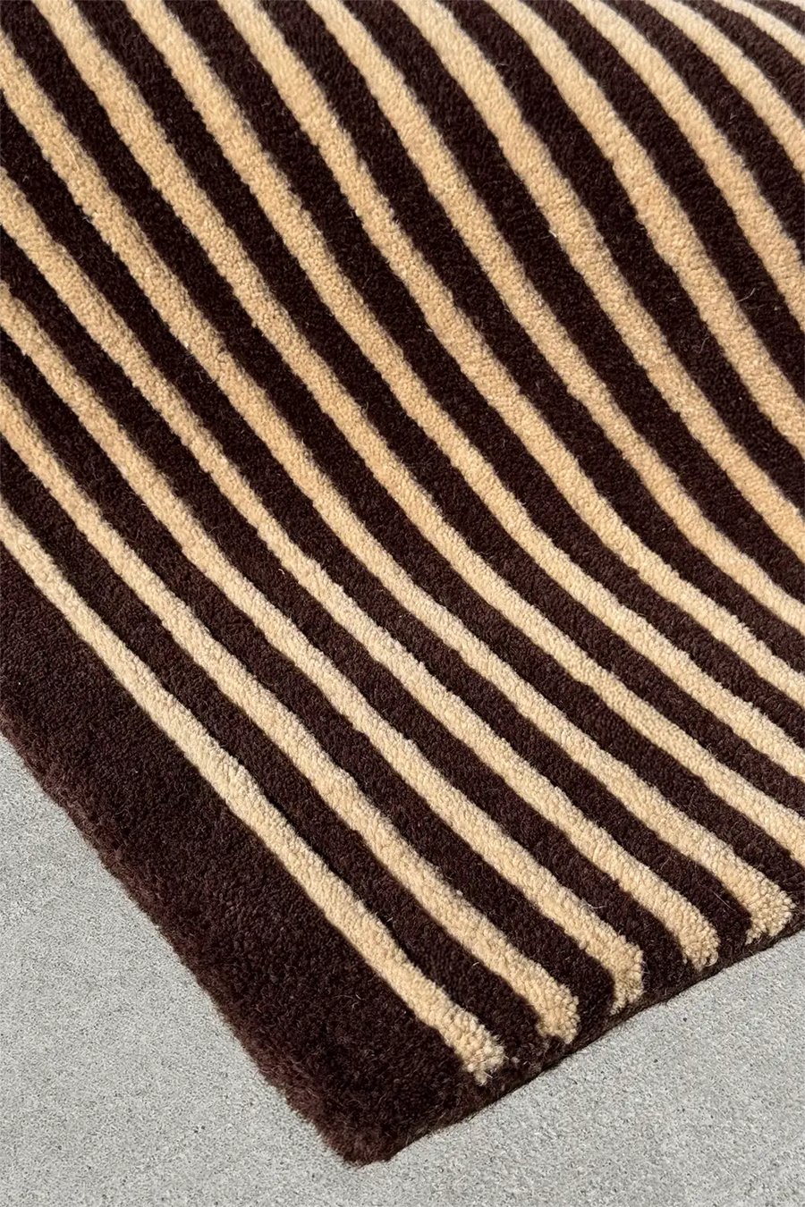 Modern brown 4x6 wool area rug with graphic stripe design