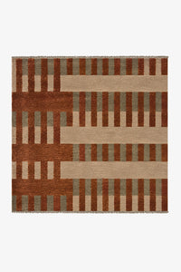 square striped rug with multicolor burnt orange, cream, and green pattern