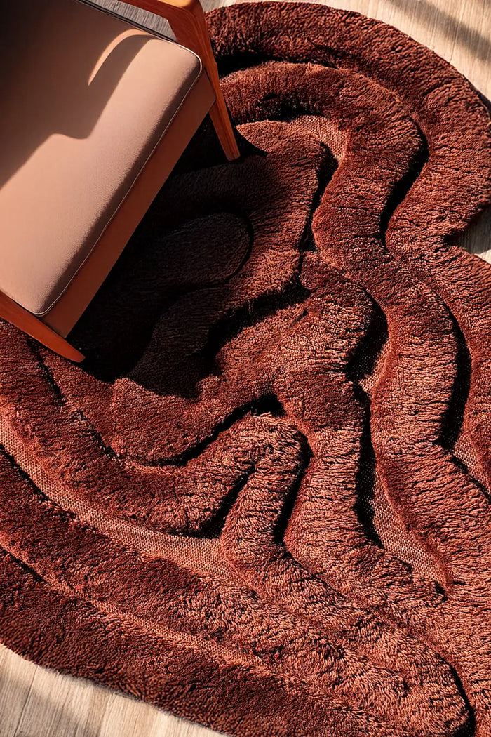 plush brown shag rug with organic carved lines and thick cozy texture in a modern sunny living room lifestyle