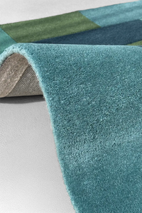 wool pile of a light blue teal wool runner rug in custom sizes