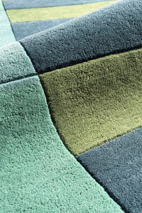 plush texture of a teal and navy square rug