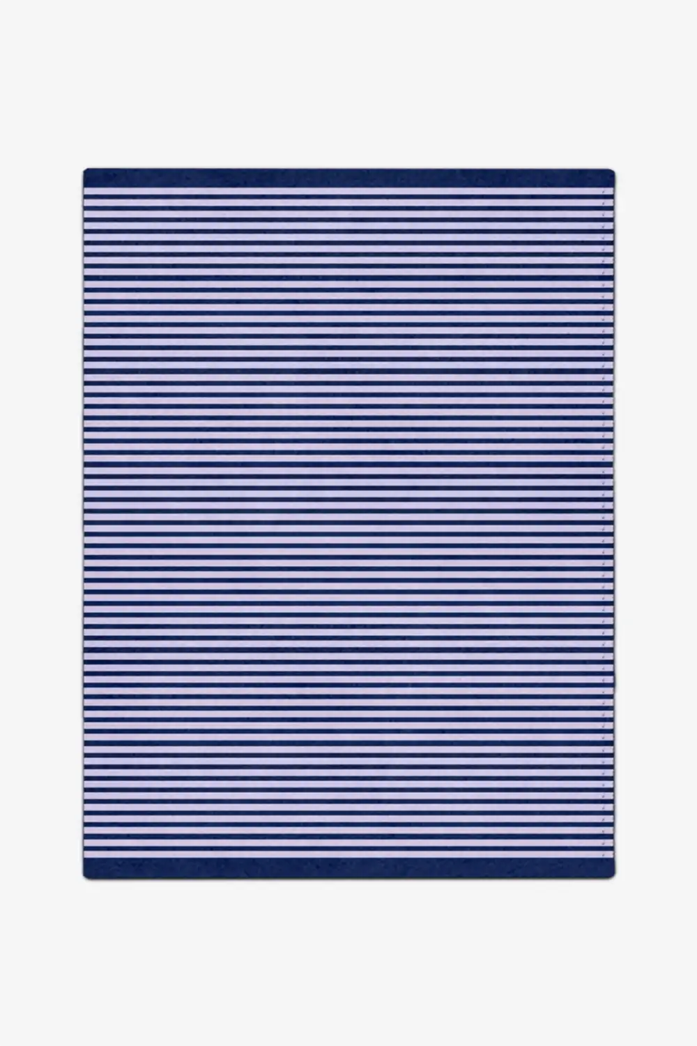 Navy and white striped rug on a plain background