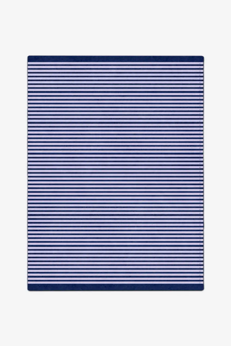 Navy and white striped rug on a plain background