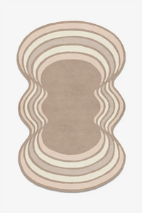 Rug with wavy striped pattern on a plain background