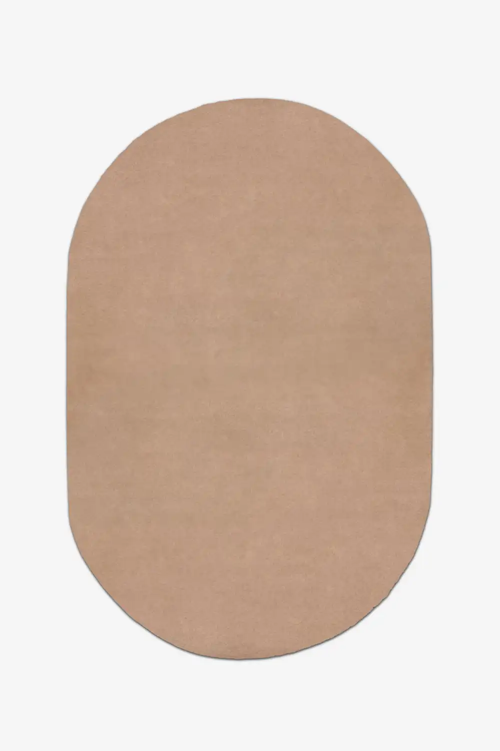 Beige light brown oval tufted rug on a white background