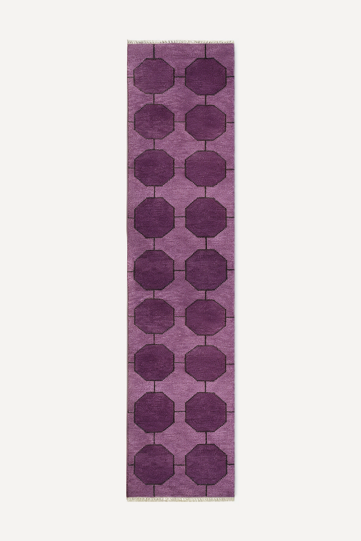 a purple runner rug with a geometric octagon pattern