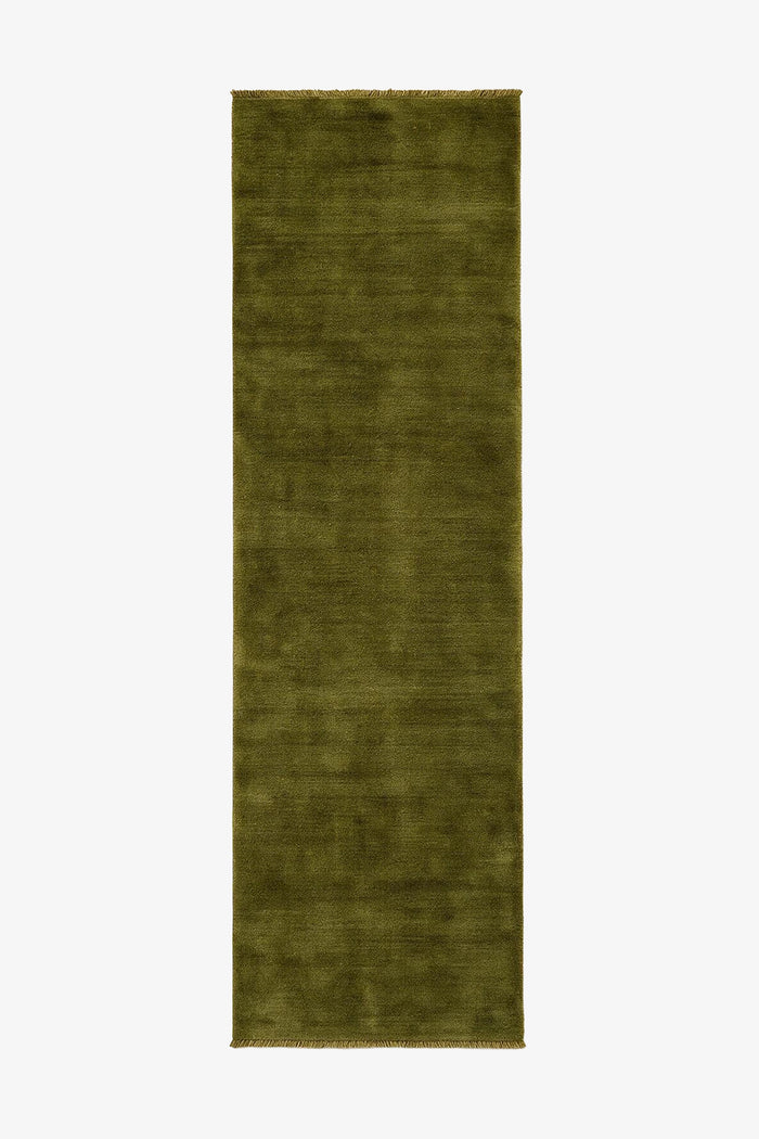 olive green hand-knotted wool runner rug with fringe