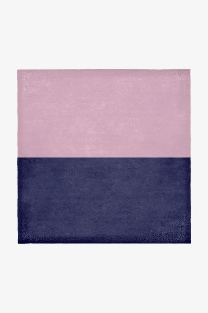 Modern pink and navy wool square rug available in 8x8 and 9x9 sizes, perfect for fun contemporary living rooms, artistic bedrooms, or playful eclectic spaces.