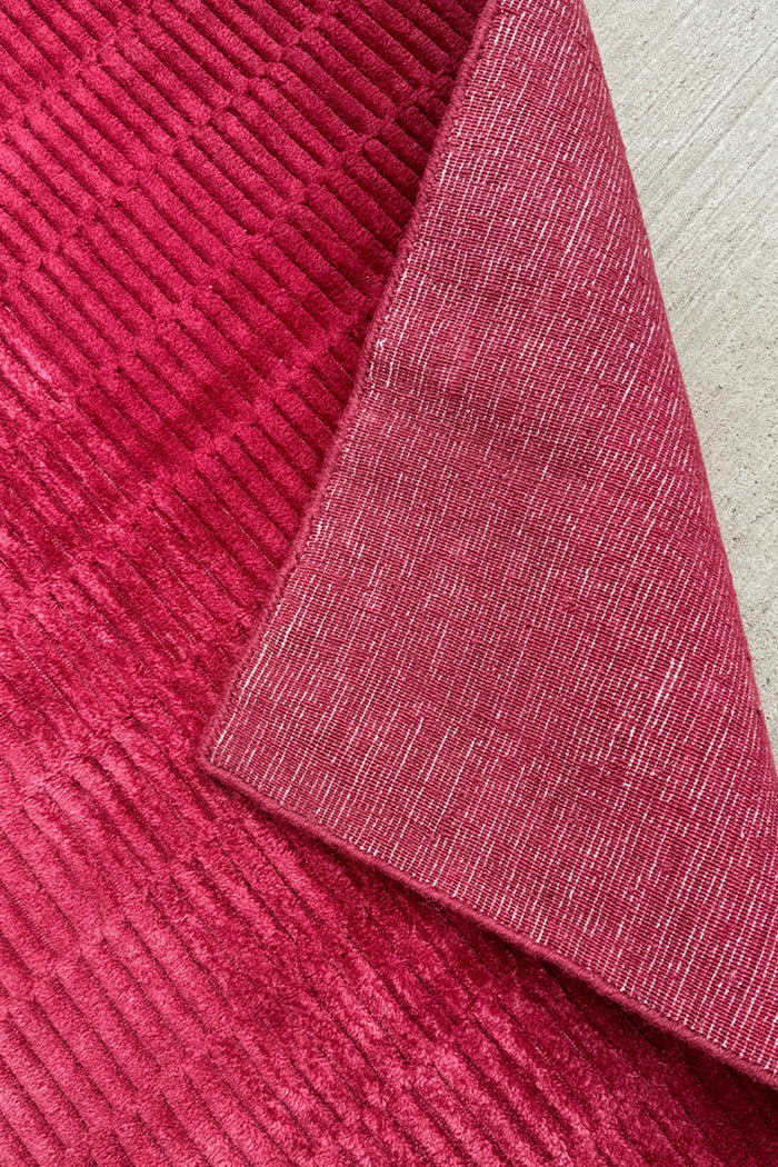 close up view of hot pink runner rug handmade in wool