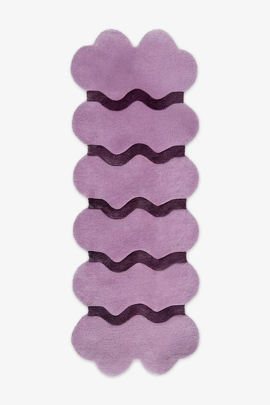 Whimsical 2x6 lavender and plum purple wavy runner rug, adding a pop of color and fun to bedrooms, nurseries, or eclectic living rooms.