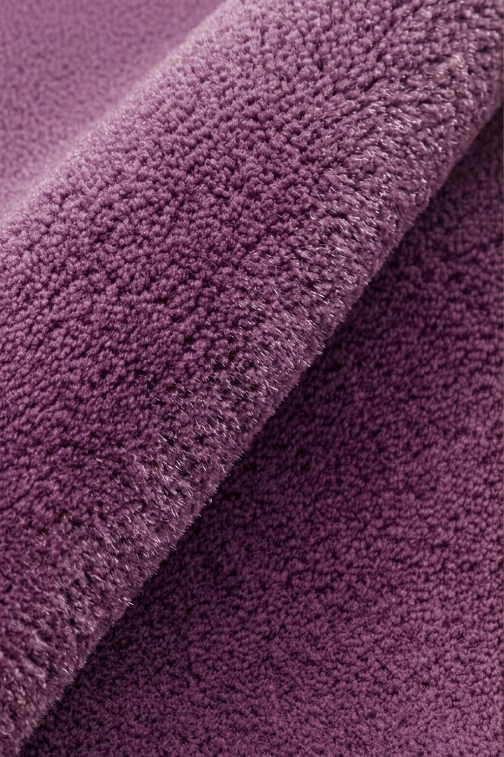 Close-up of purple textured wool rug