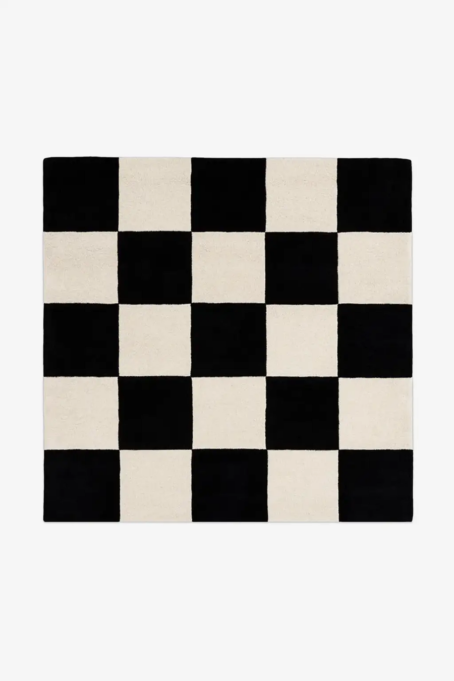 Square checkered black and white rug on a white background