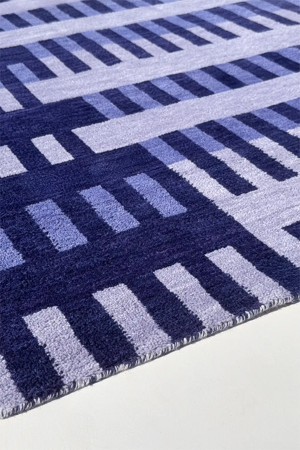 blue striped rug in square format