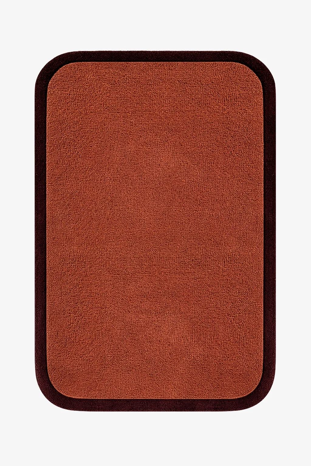 modern brown rug with a dark border on a white background hand-tufted wool