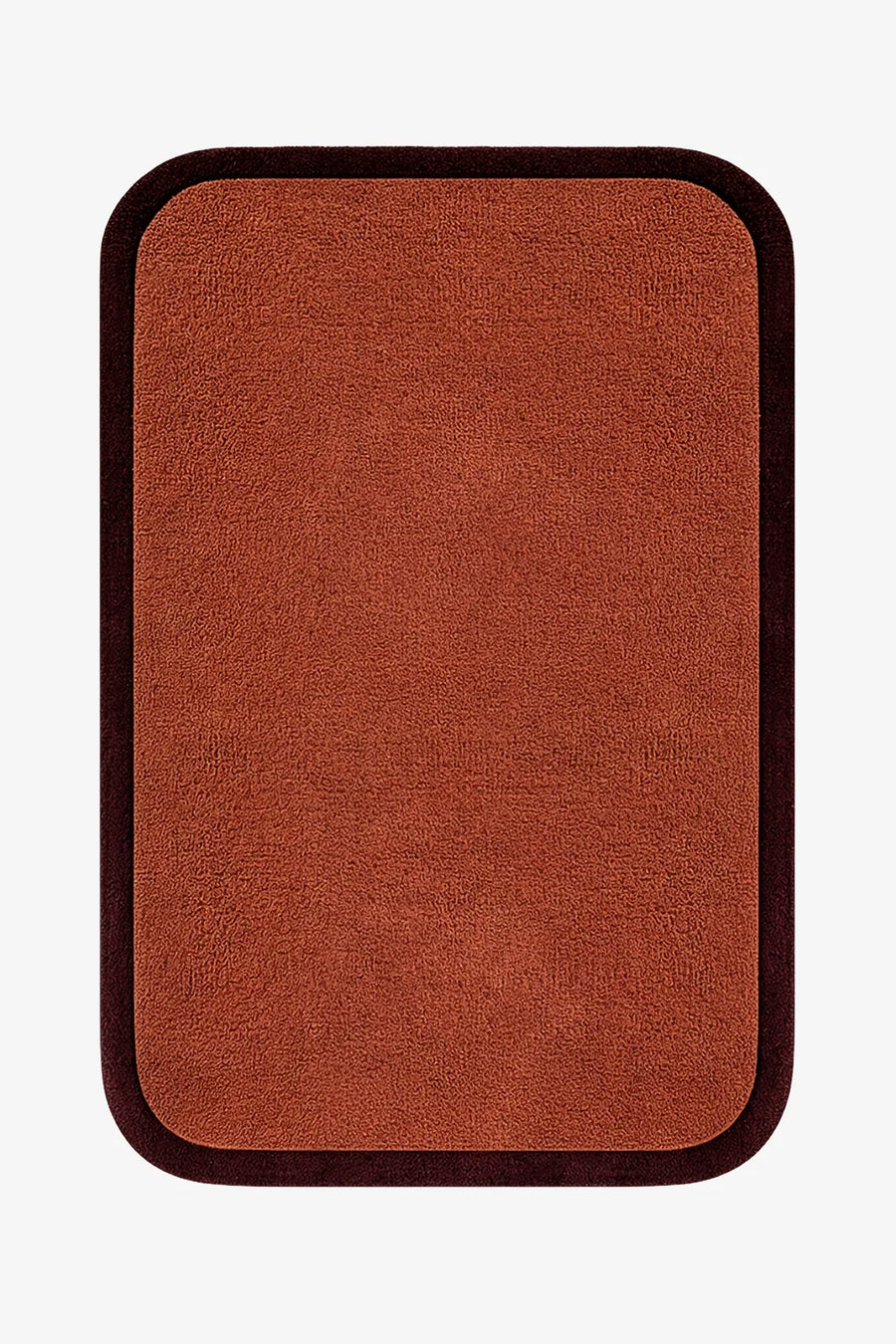 modern brown rug with a dark border on a white background hand-tufted wool