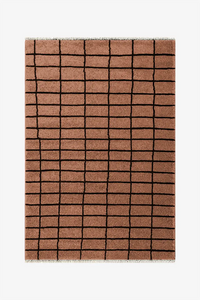 Brown checkered rug on a white background